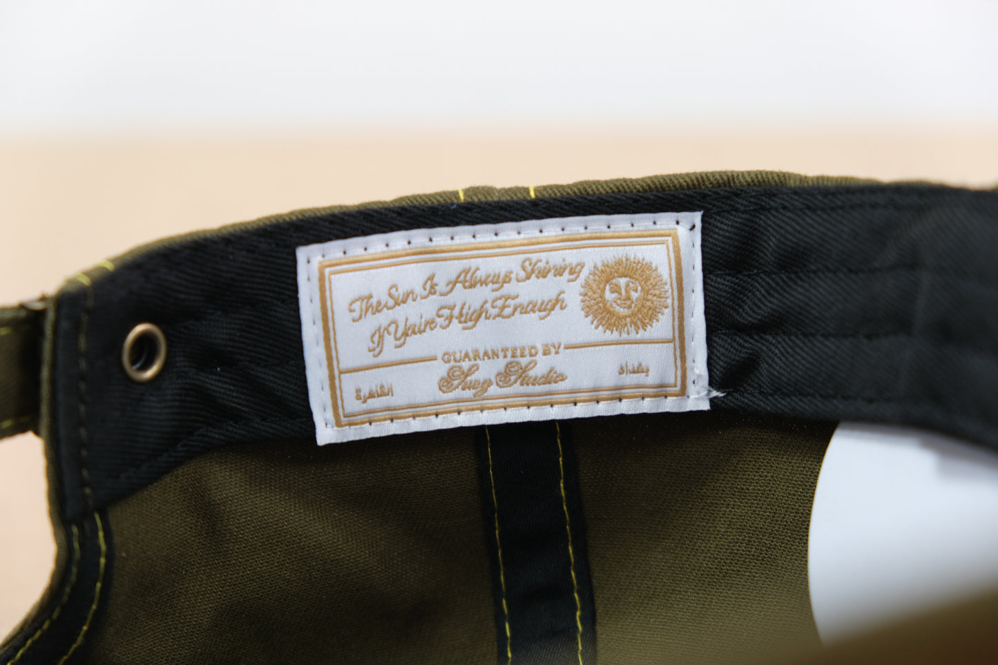 KHAKI SUN ARABIC TRUCKER